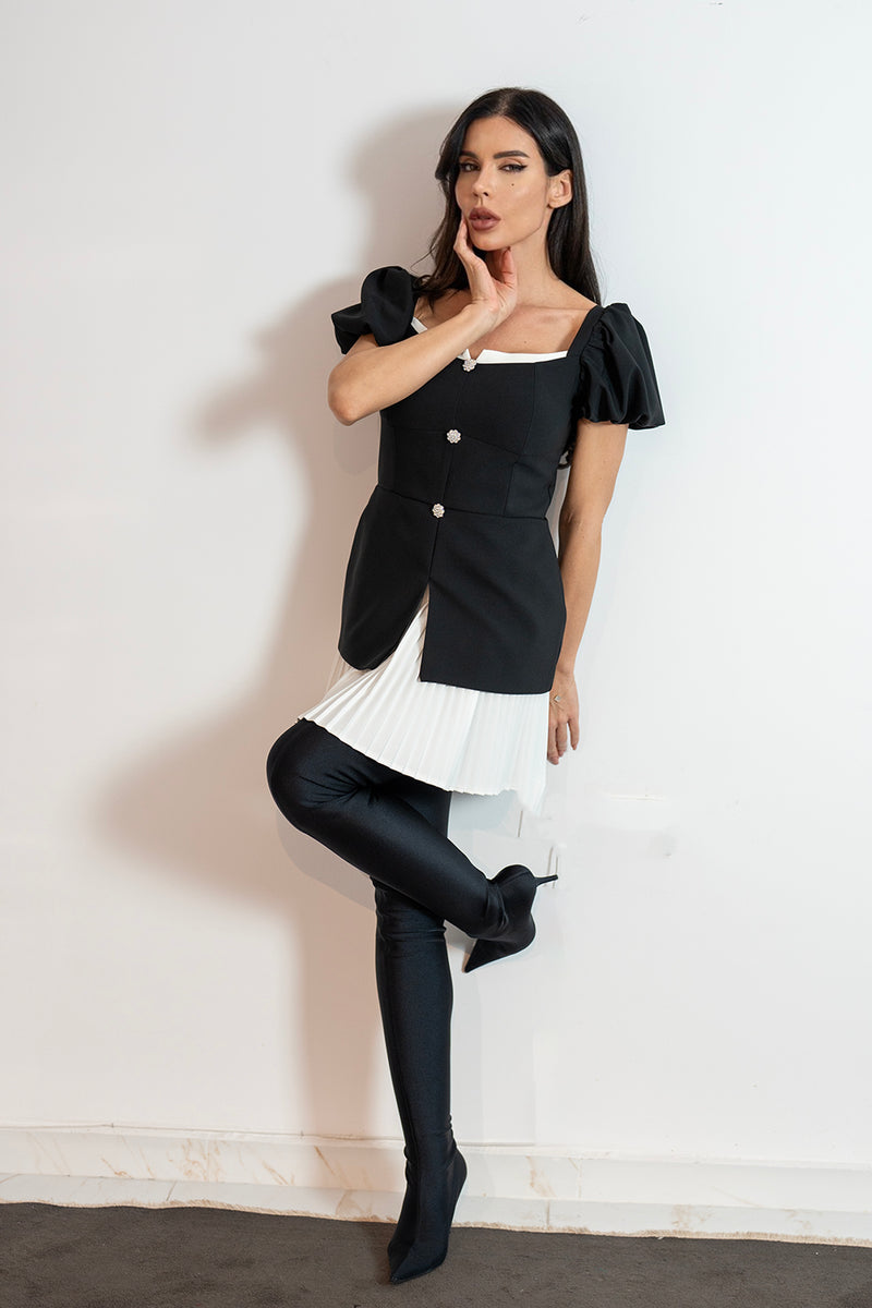 Alya în rochie neagră