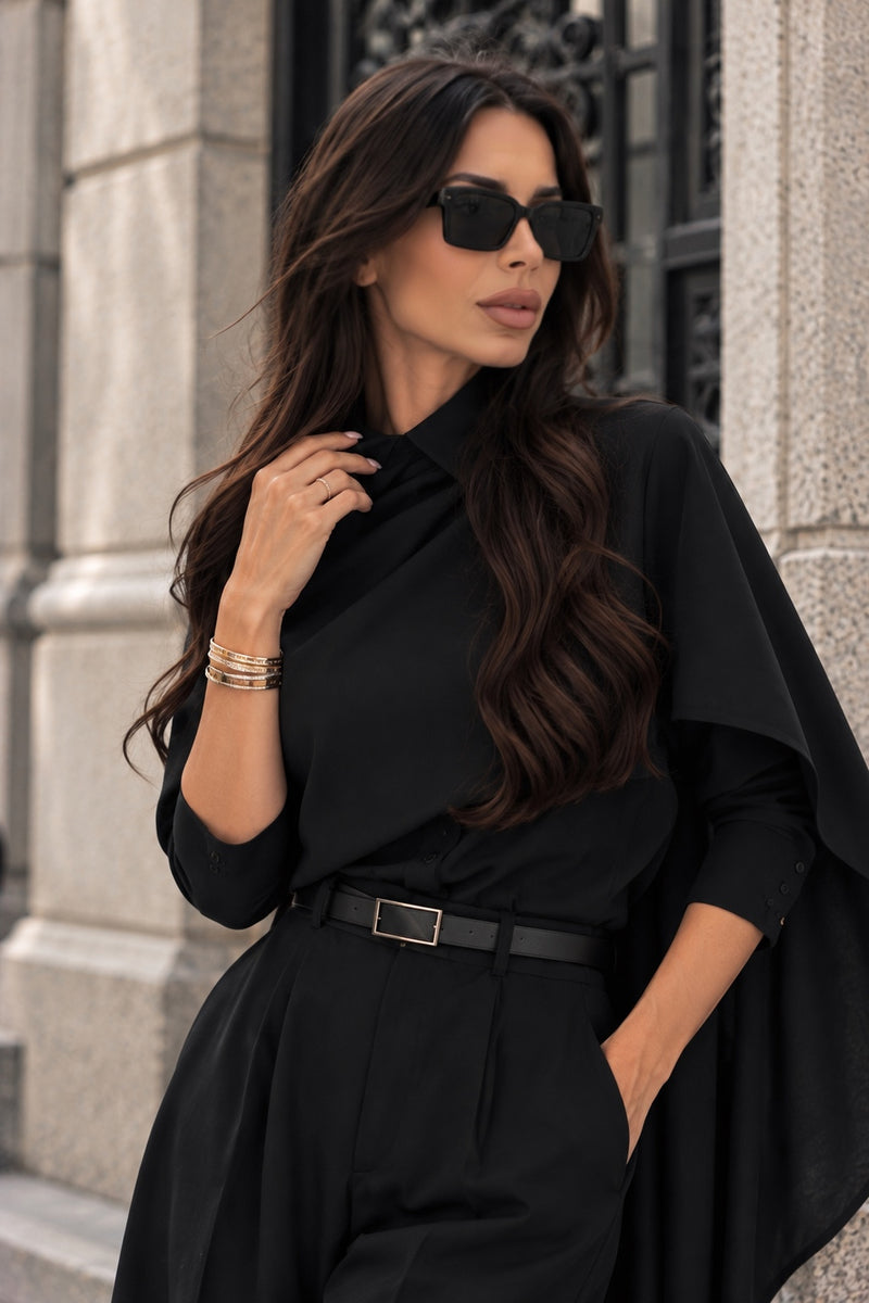 Replica black draped outfit close-up
